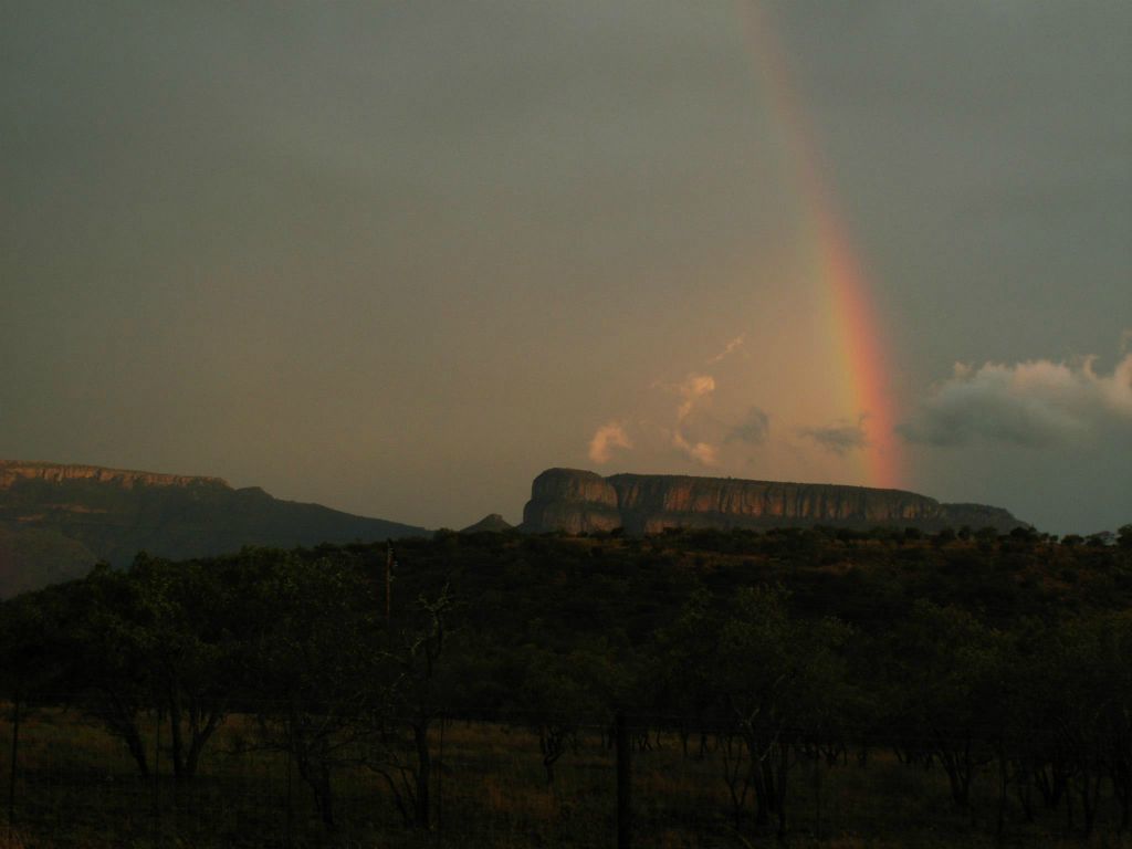 PRETORIA -> KRUGER NATIONAL PARK - een regenboog onderweg