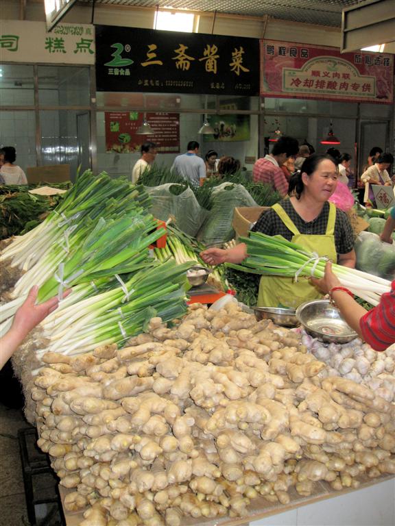 BEIJING - groenten op een lokale markt