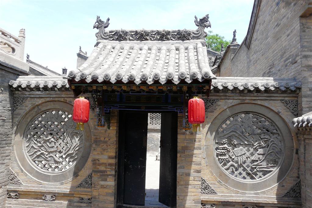 PINGYAO (Wang Family Courtyard)- afscheidingsmuur op een binnenplaats