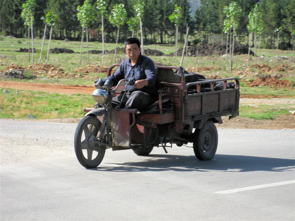LIJIANG - een bakmotorfiets