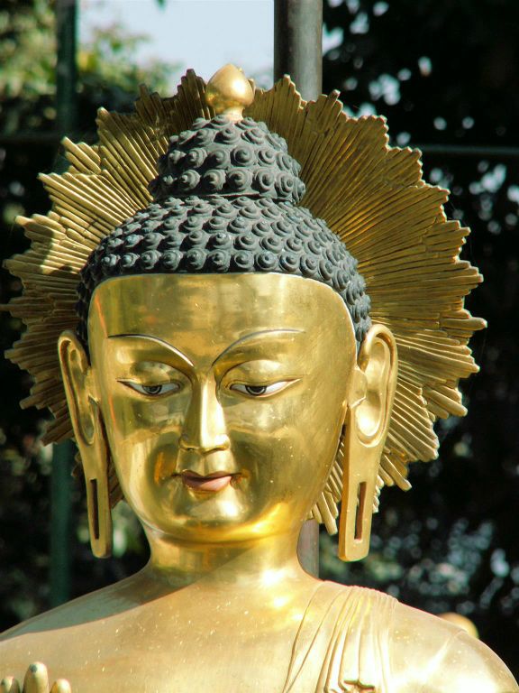 NEPAL - KATHMANDU - een boeddha beeld bij de Swayambhunath stoepa