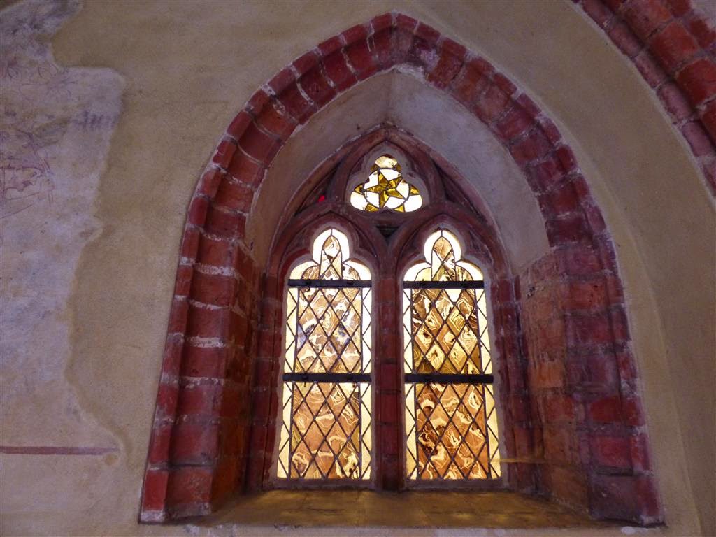MALBORK - een glas en lood raam in het kasteel van de Duitse Orde