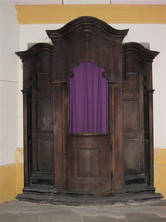 DUBA - een biechtstoel in de kerk