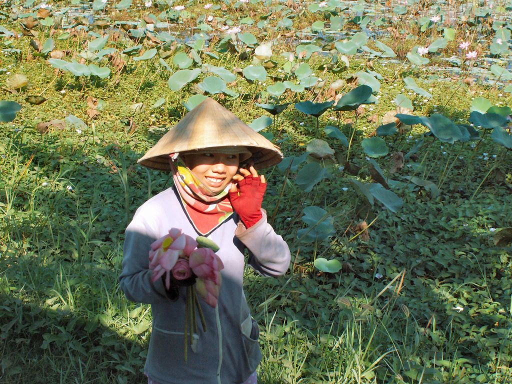 SAIGON -> CAN THO - een waterbloem verkoopster