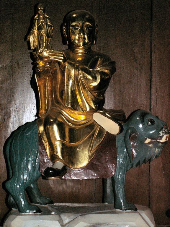 SAIGON -> CAN THO - een beeld bij de My Tho de Vinh Trang pagoda