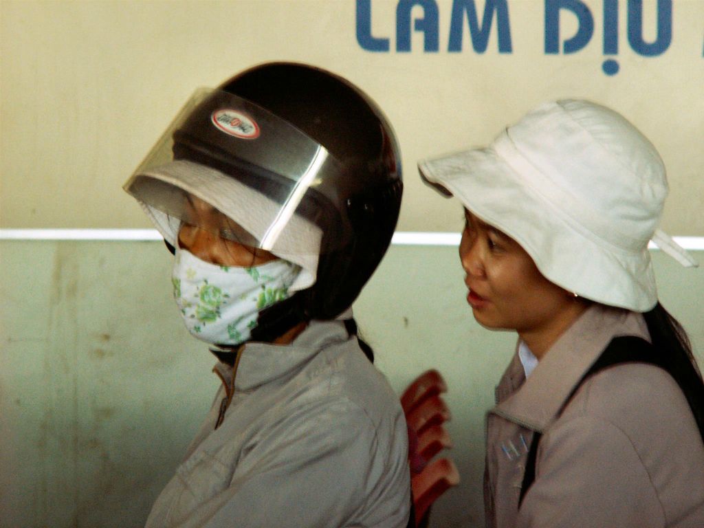 SAIGON -> CAN THO - twee mensen op de veerboot